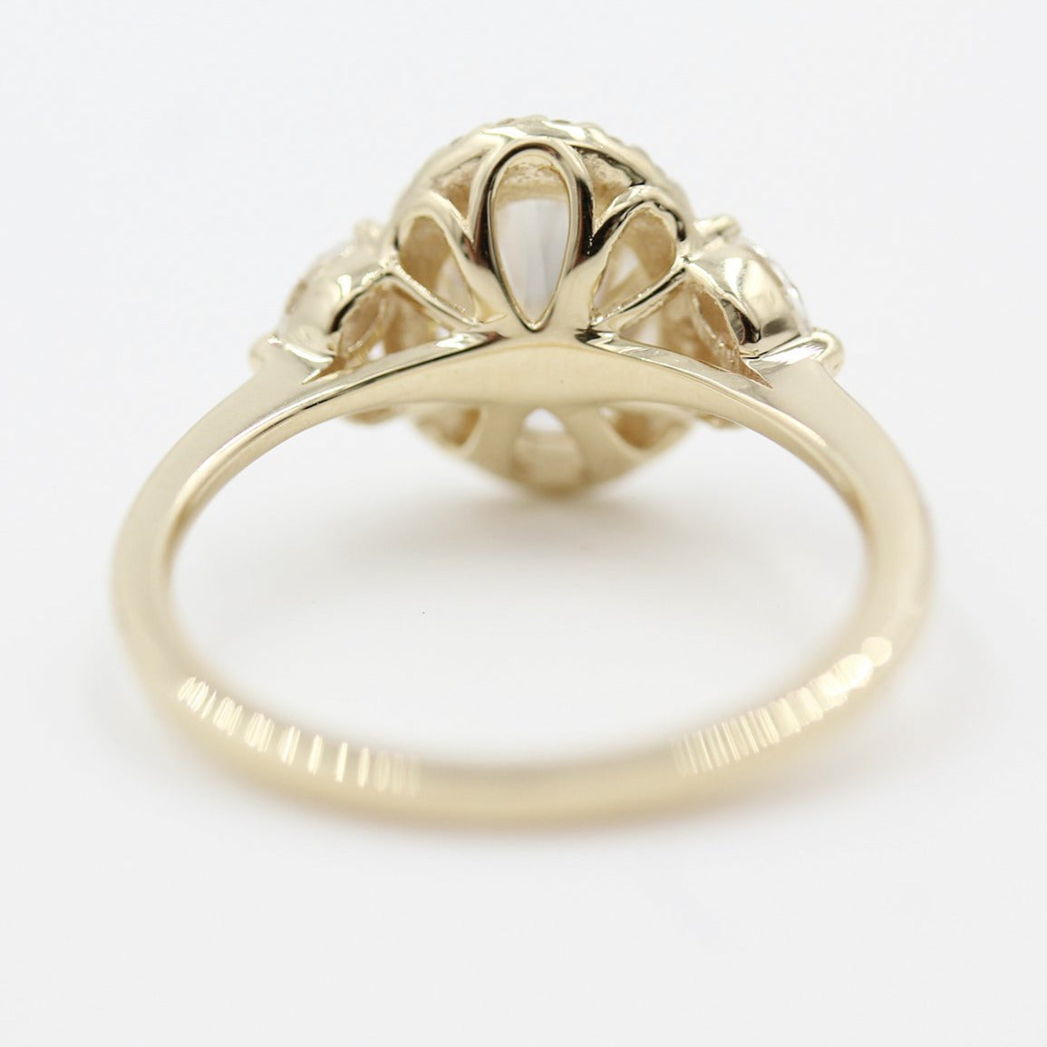 10K Yellow Gold Oval Cut Halo Solitaire Accent Ring