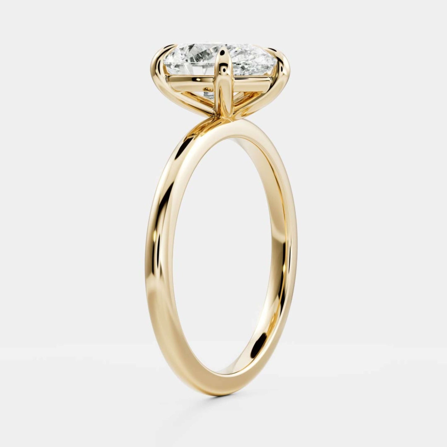 18K Gold Pear Cut Diamond Basket Style Ring