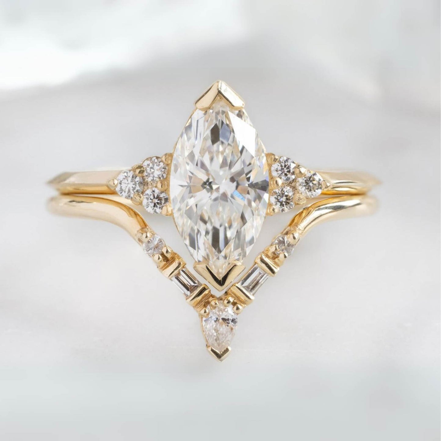 Delicate Marquise cut Moissanite engagement ring
