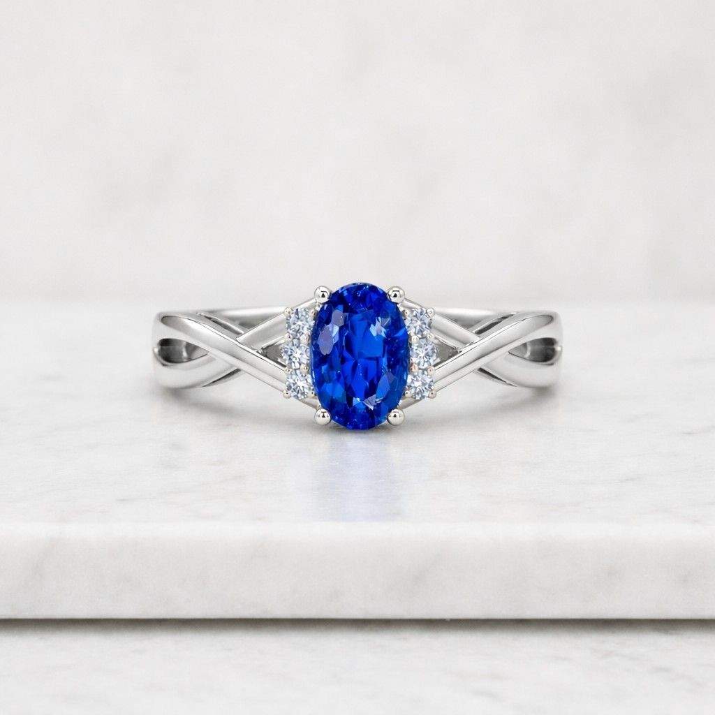 oval cut ring blue gemstone ring sapphire jewelry gold jewelry twisted ring crossover band criss cross ring infinity band ring knot style ring modern ring vintage style ring heirloom ring bridal jewelry wedding ring