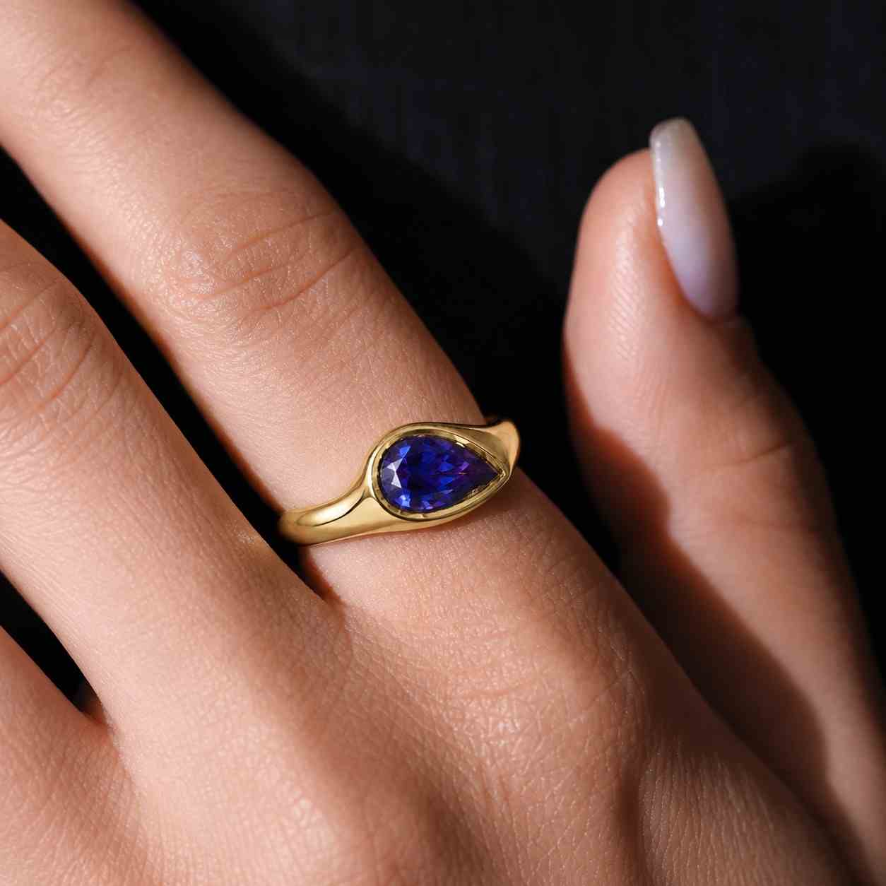 10k rose gold oval sapphire pear diamond engagement ring, full bezel setting
