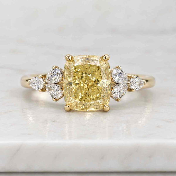 14K Gold Cushion Cut Fancy Yellow Lab Grown Diamond Three Stone Engagement Ring with Emerald Trapezoid Side Stones Bridal Ring.
