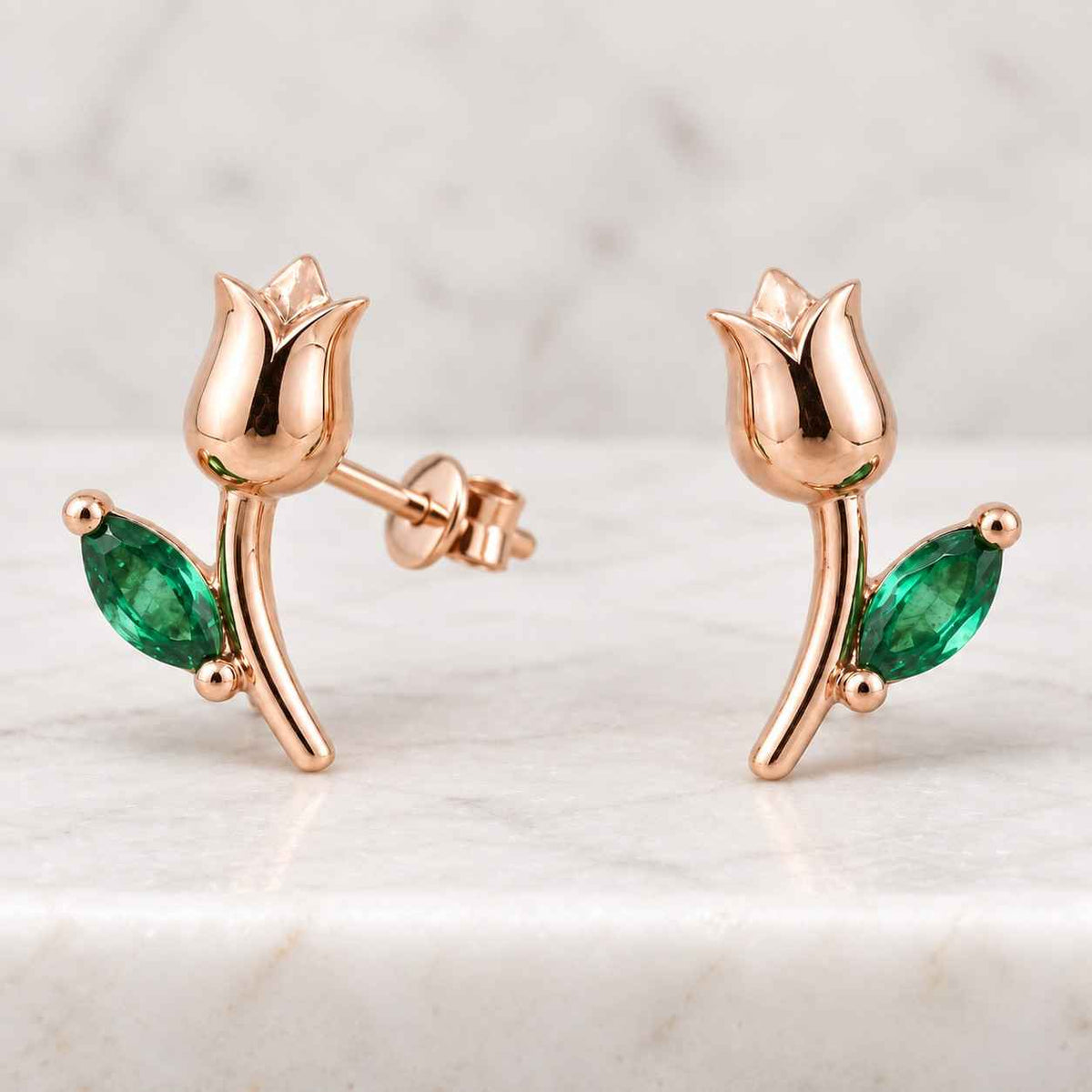 14k gold marquise zambia emerald diamond stud earrings

