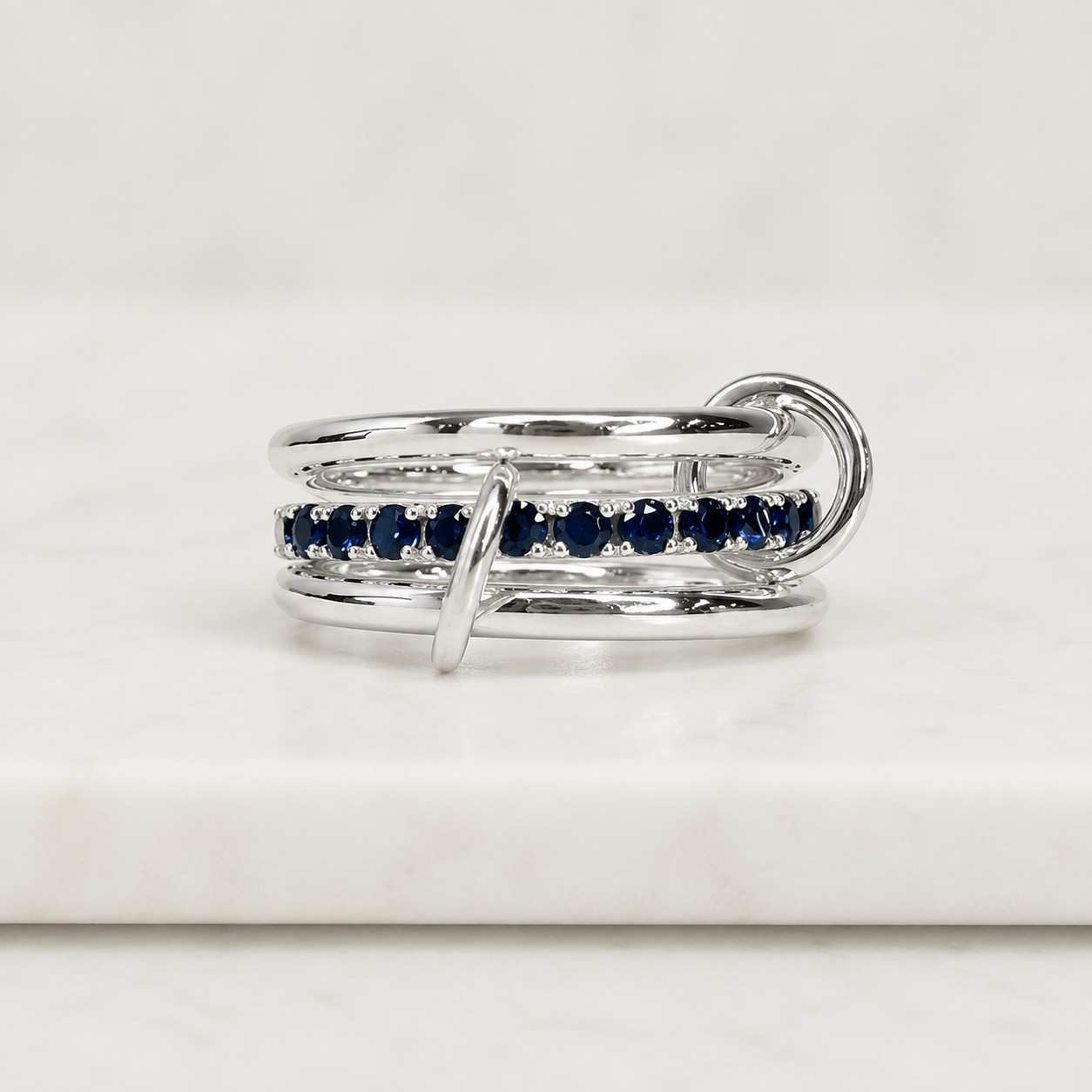 14k gold multi-link connected ring with gemstones