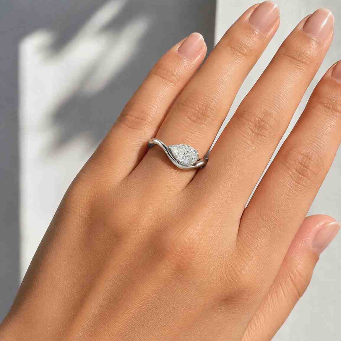 14k gold pear cut lab grown diamond ring, wave wedding band