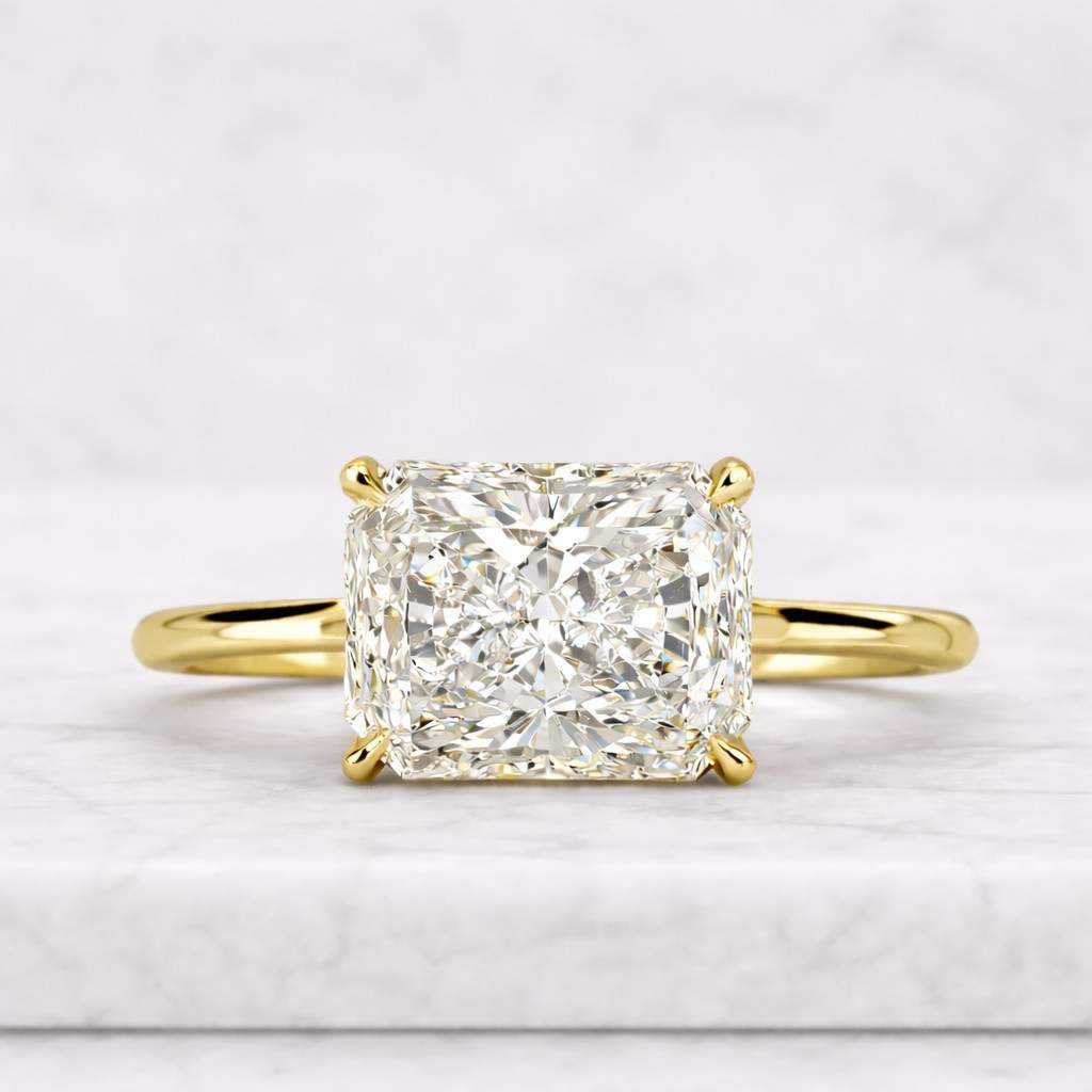 14k yellow gold double claw prong ring