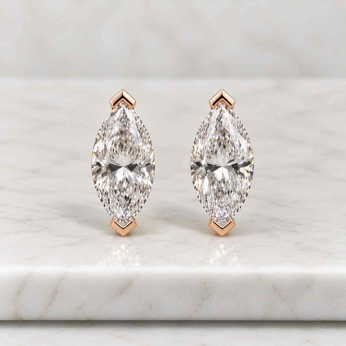 14k yellow gold marquise lab grown diamond huggie earrings (