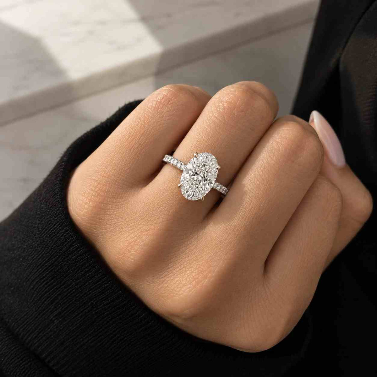 2 ct oval lab grown diamond engagement ring, graduated diamond shank, 14k yellow gold
