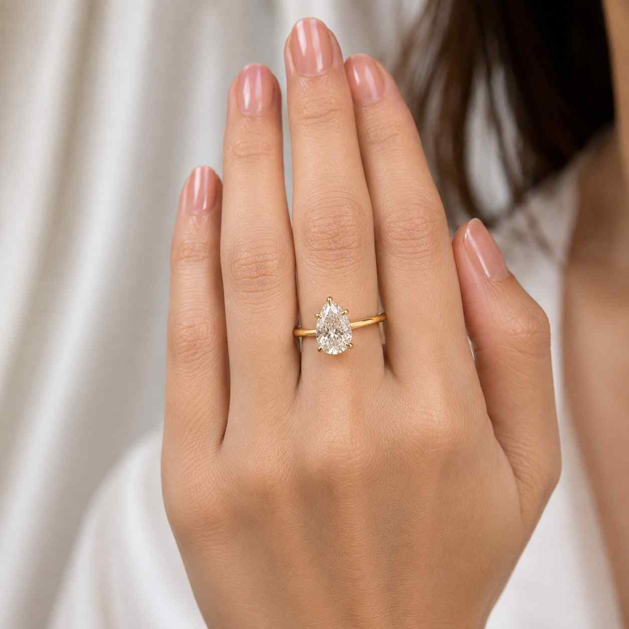 2 carat d color vvs2 clarity igi certified pear cut lab grown diamond solitaire engagement ring 14k yellow gold 5 prongs