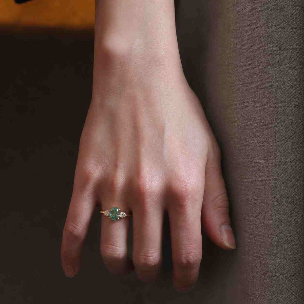 3 ct oval fancy vivid green lab grown diamond three stone engagement ring, pear side stones, 14k yellow gold, igi certified
