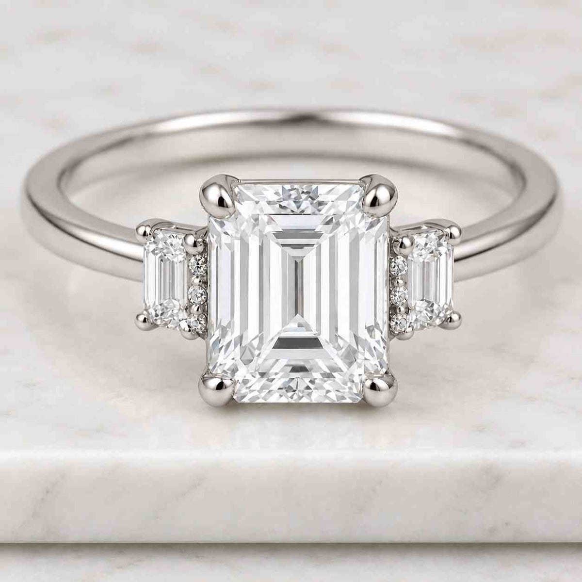 3 carat igi certified e color vvs1 clarity emerald cut lab grown diamond three stone engagement ring, side baguettes 14k white gold