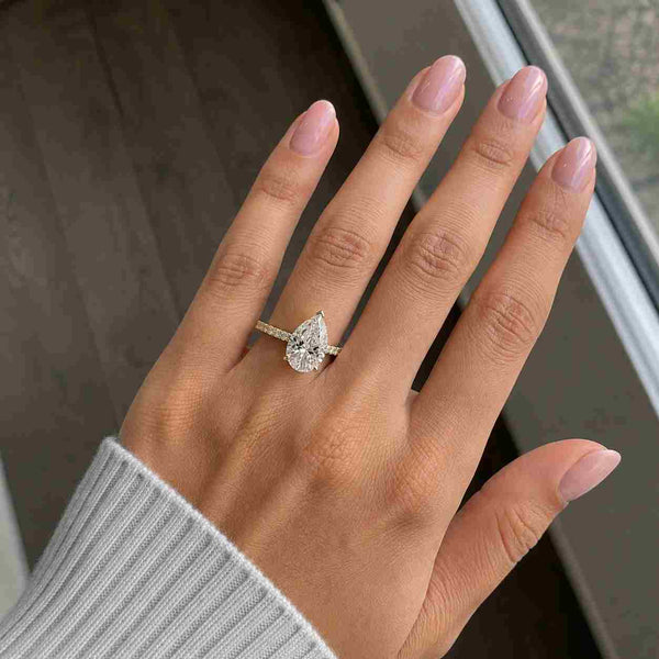 3 prong pear cut moissanite diamond pave engagement ring
