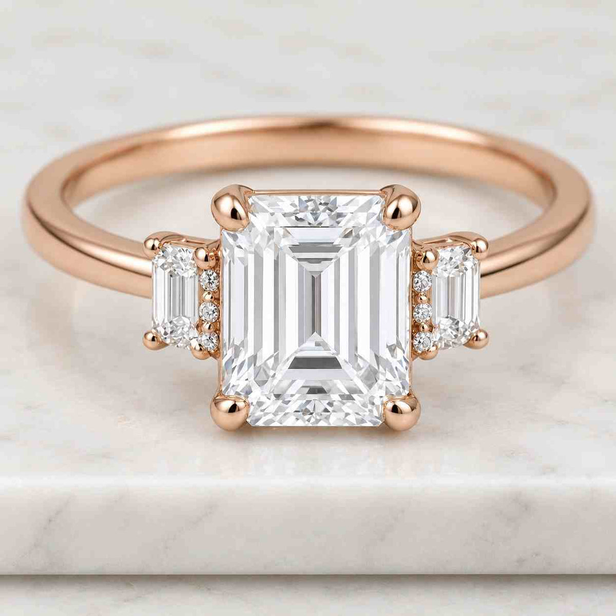 5 carat emerald cut lab-grown diamond three stone engagement ring  trapezoids side stones 14k white gold luxurious trilogy diamond ring