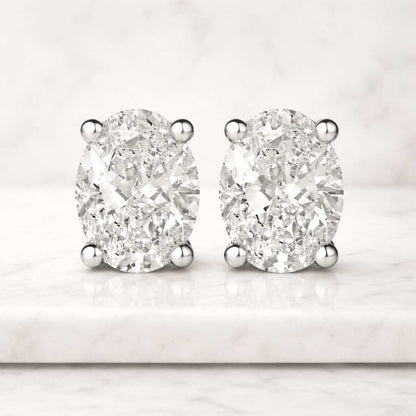4 Carat Oval Cut Lab Grown Diamond Stud Earrings: 14K Yellow Gold