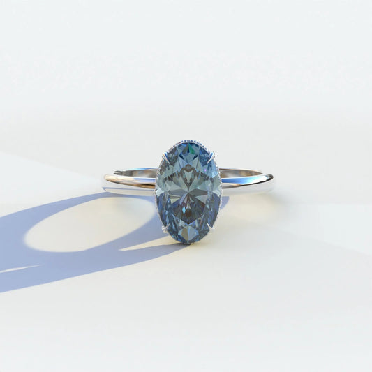 Blue Diamond Solitaire Engagement Ring