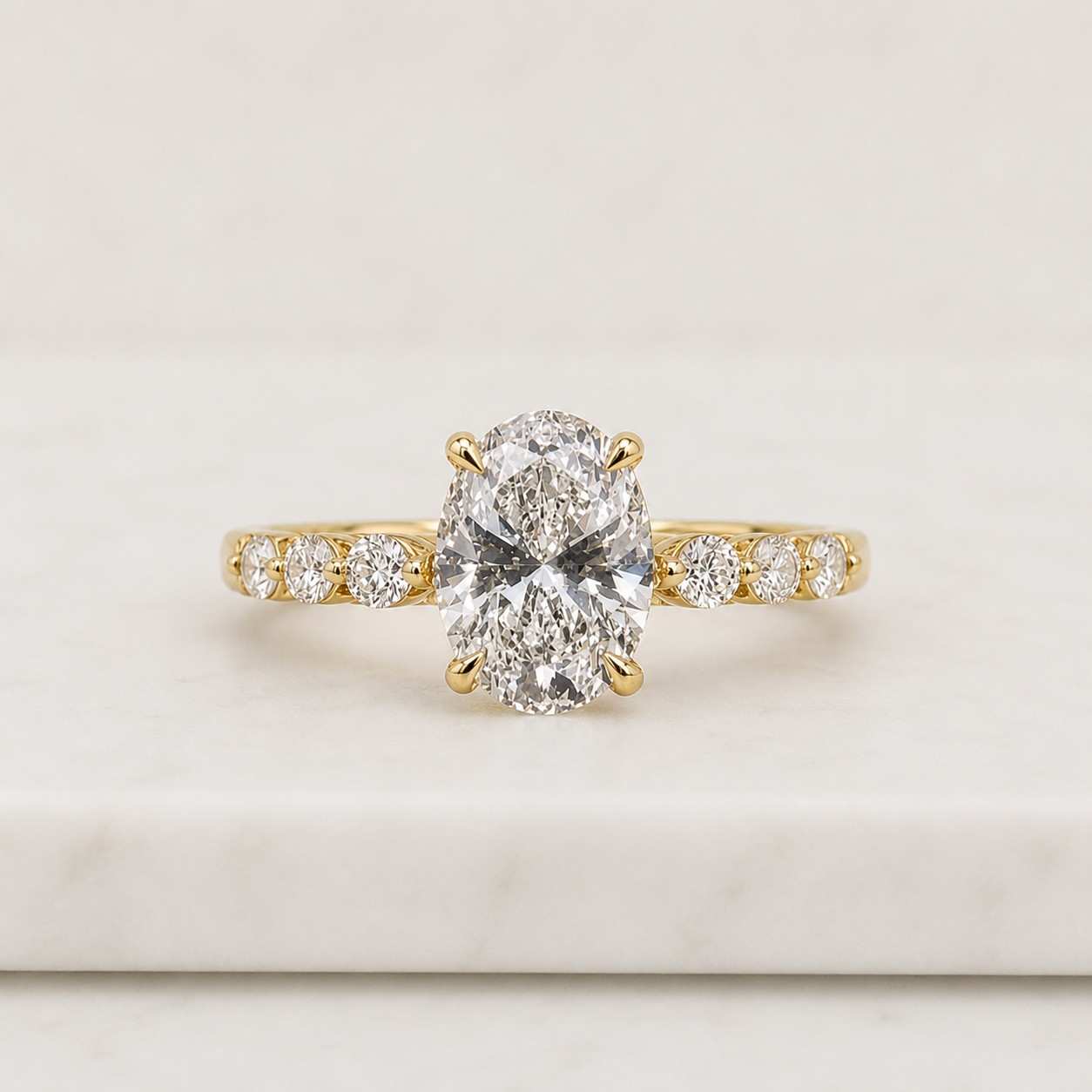 oval cut lab grown diamond pavé engagement ring in 14k white gold