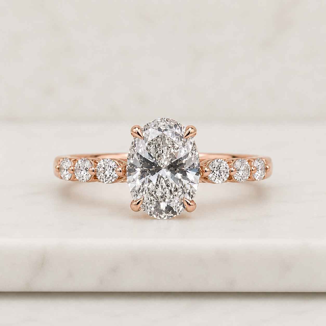oval cut lab grown diamond pavé engagement ring in 14k white gold