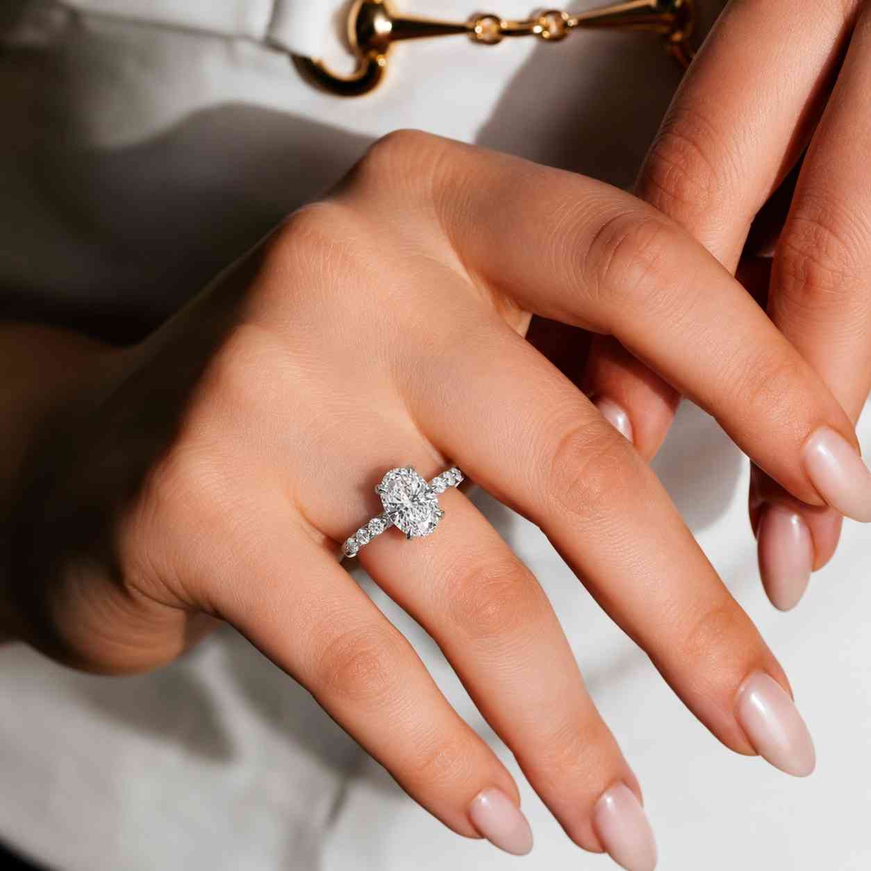 oval cut lab grown diamond pavé engagement ring in 14k white gold