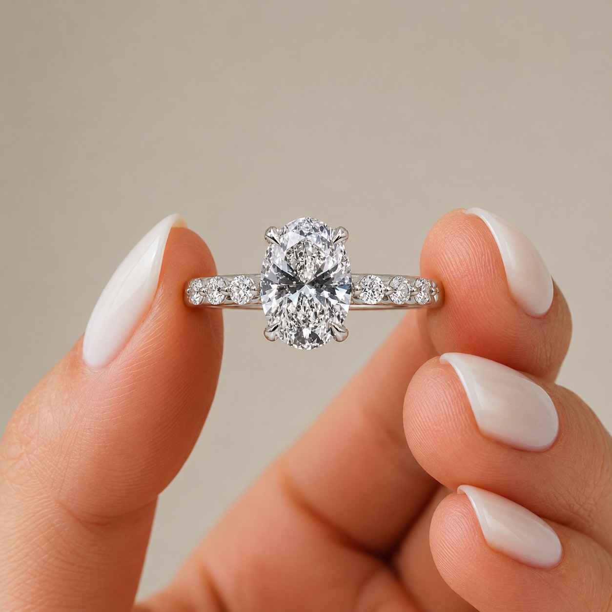 oval cut lab grown diamond pavé engagement ring in 14k white gold