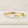 Three Prong Set Pear Cut Diamond Wedding Rings For Women