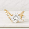 Two Stone V Shape Cushion And Emerald Diamond Ring