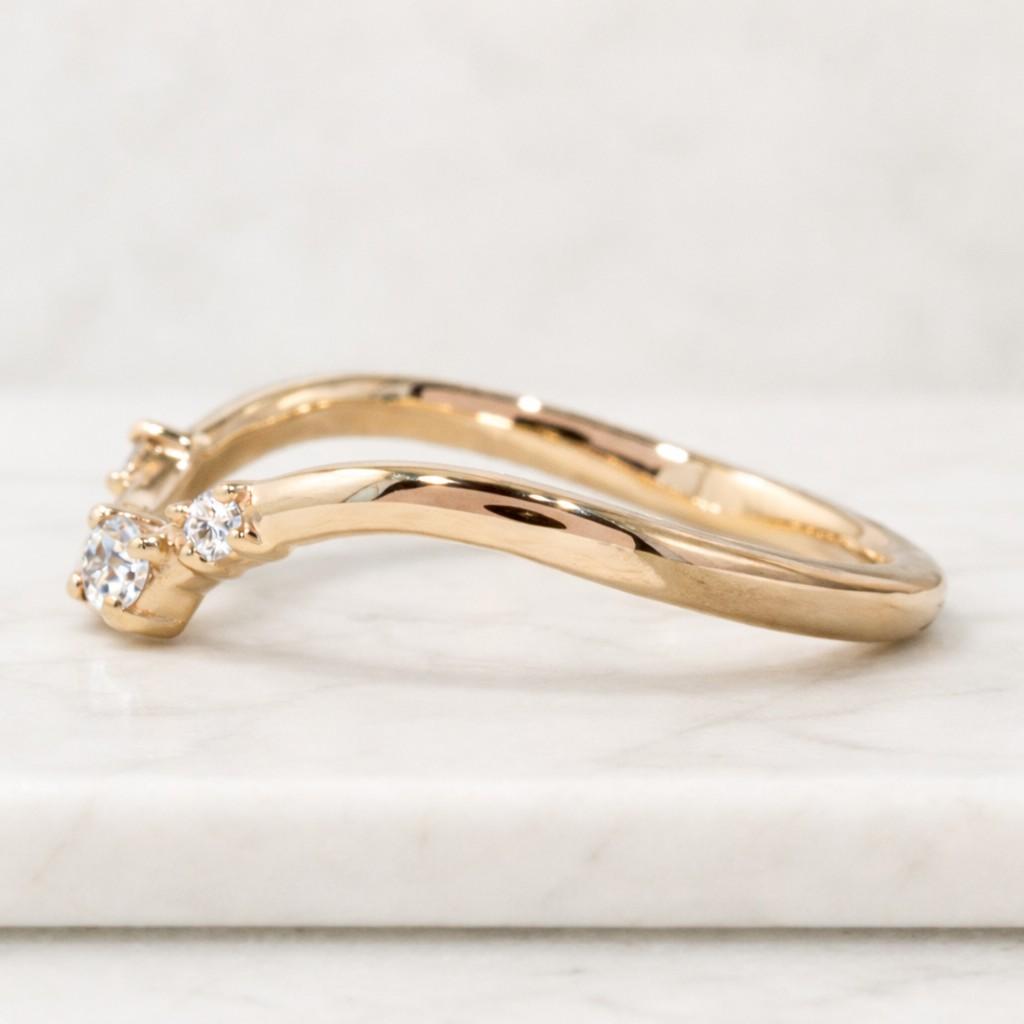 dainty diamond curved simulated diamond wedding ring 