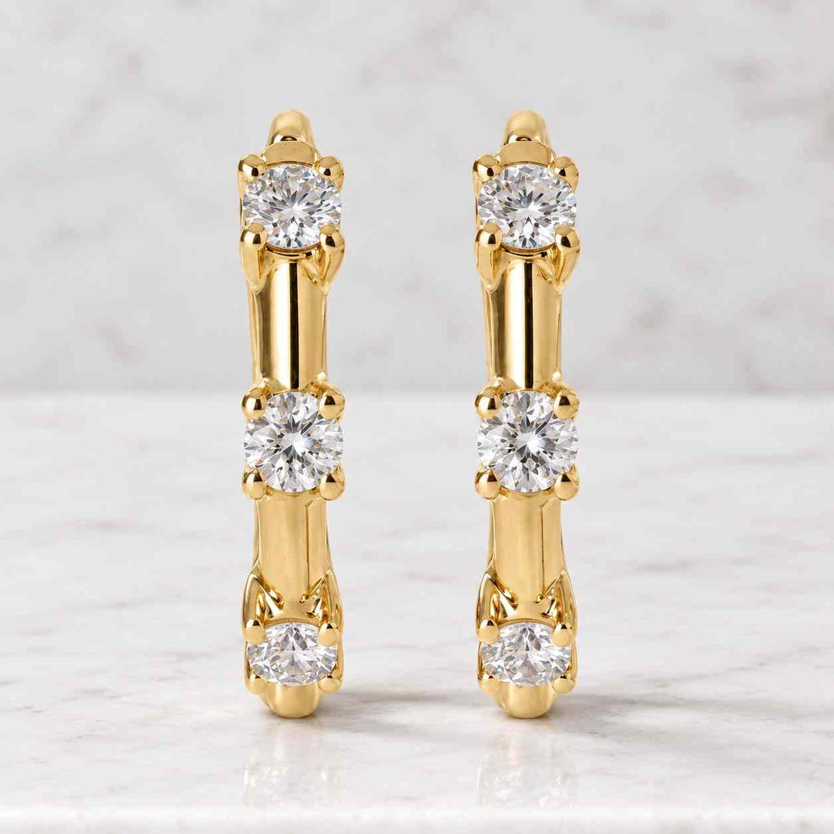 diamond pave hoop earrings: 14k solid gold huggies