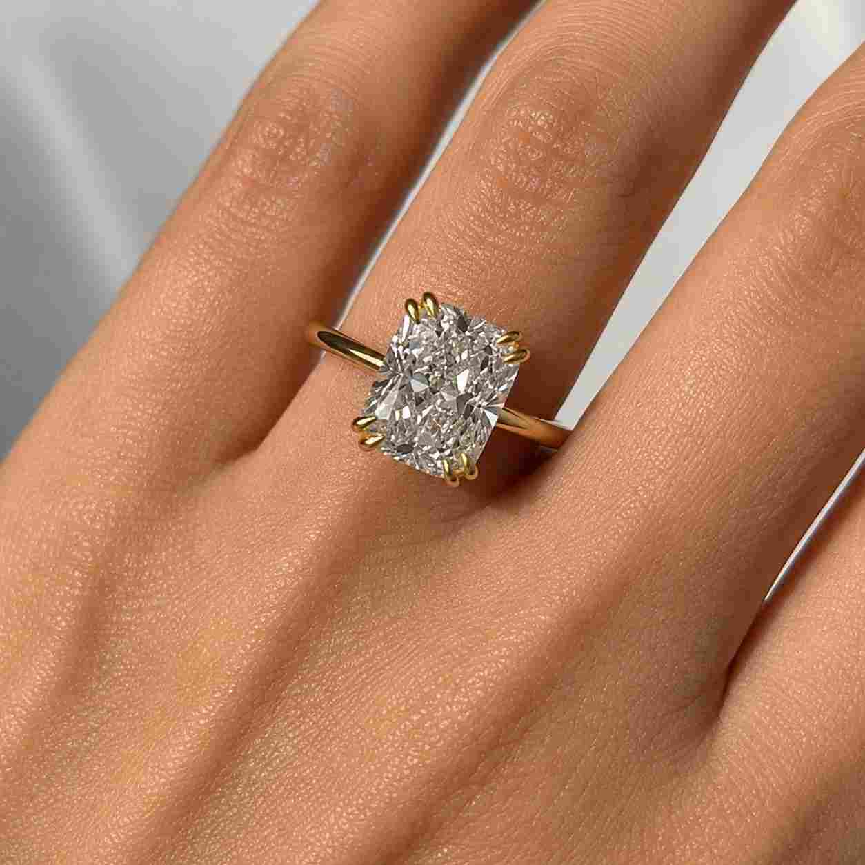 elongated cushion cut lab grown diamond or moissanite solitaire engagement ring, hidden halo
