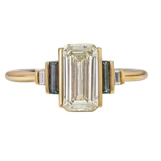 Emerald_Cut_Lab_Grown_And_Baguette_Cut_Teal_Sapphire_Side_Stone_Ring