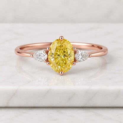 Fancy Intense Yellow Oval Diamond Engagement Ring 