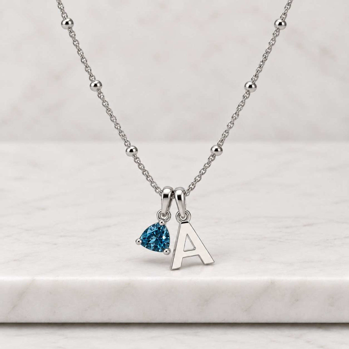 floating vintage teardrop blue topaz halo pendant necklace, blue topaz floating pendant necklace, december topaz birthstone necklace
