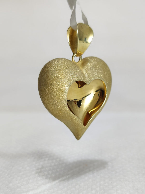 heart earrings on 14k gold studs-pear