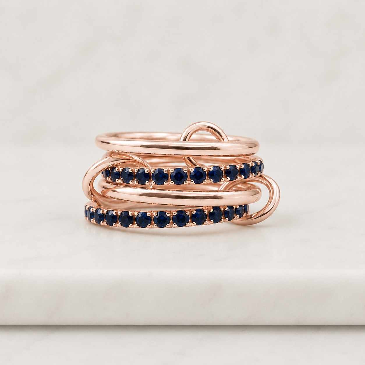 interlocking multi band ring, lab blue sapphire, aquamarine topaz, white gold ring