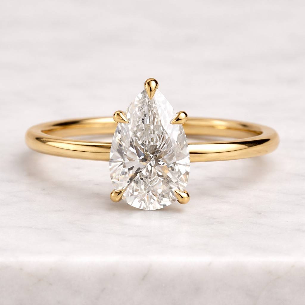 Knife Edge Pear Cut Solitaire Moissanite Engagement Ring