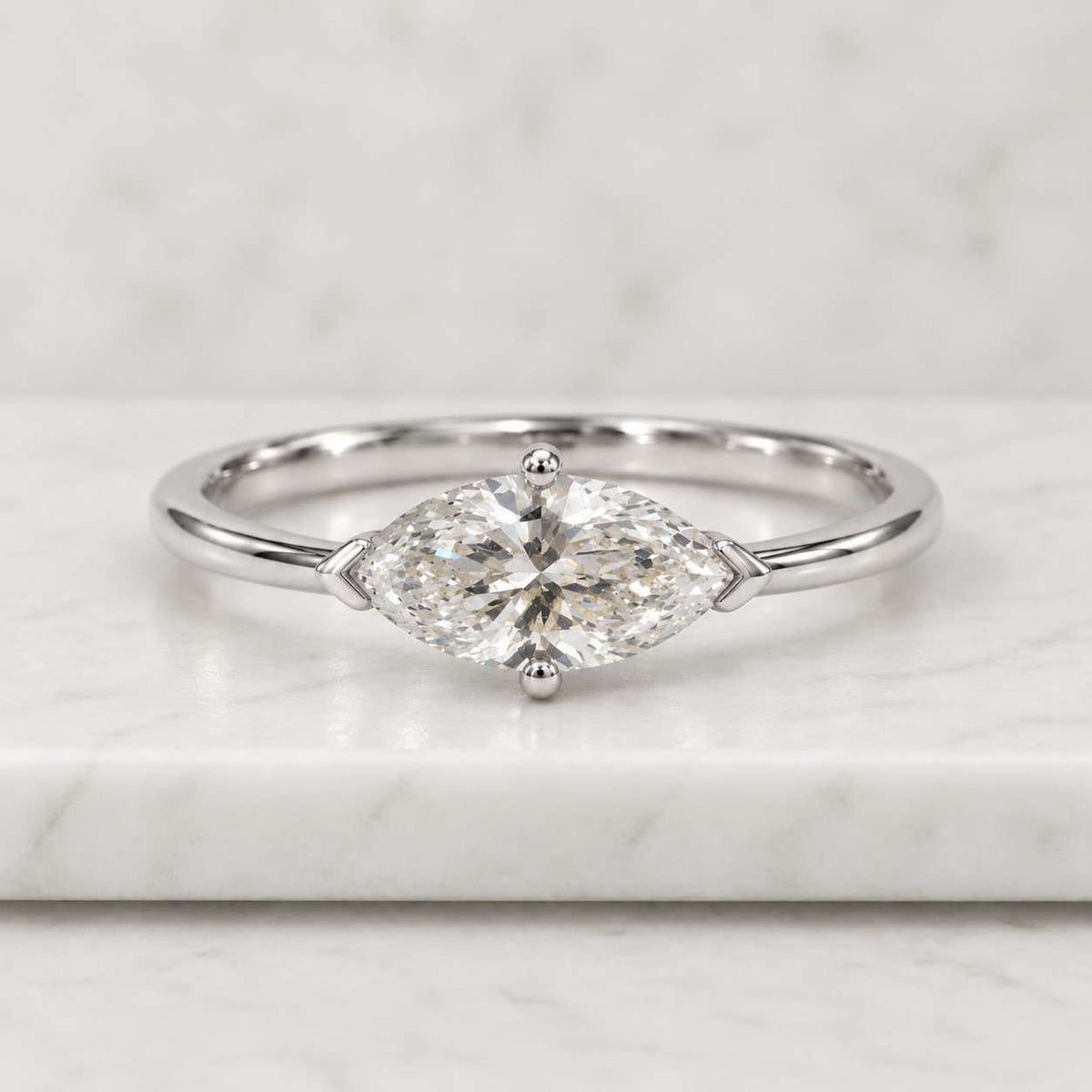 marquise e color vvs2 clarity igi certified marquise cut lab grown diamond solitaire engagement ring with hidden halo of round diamonds
