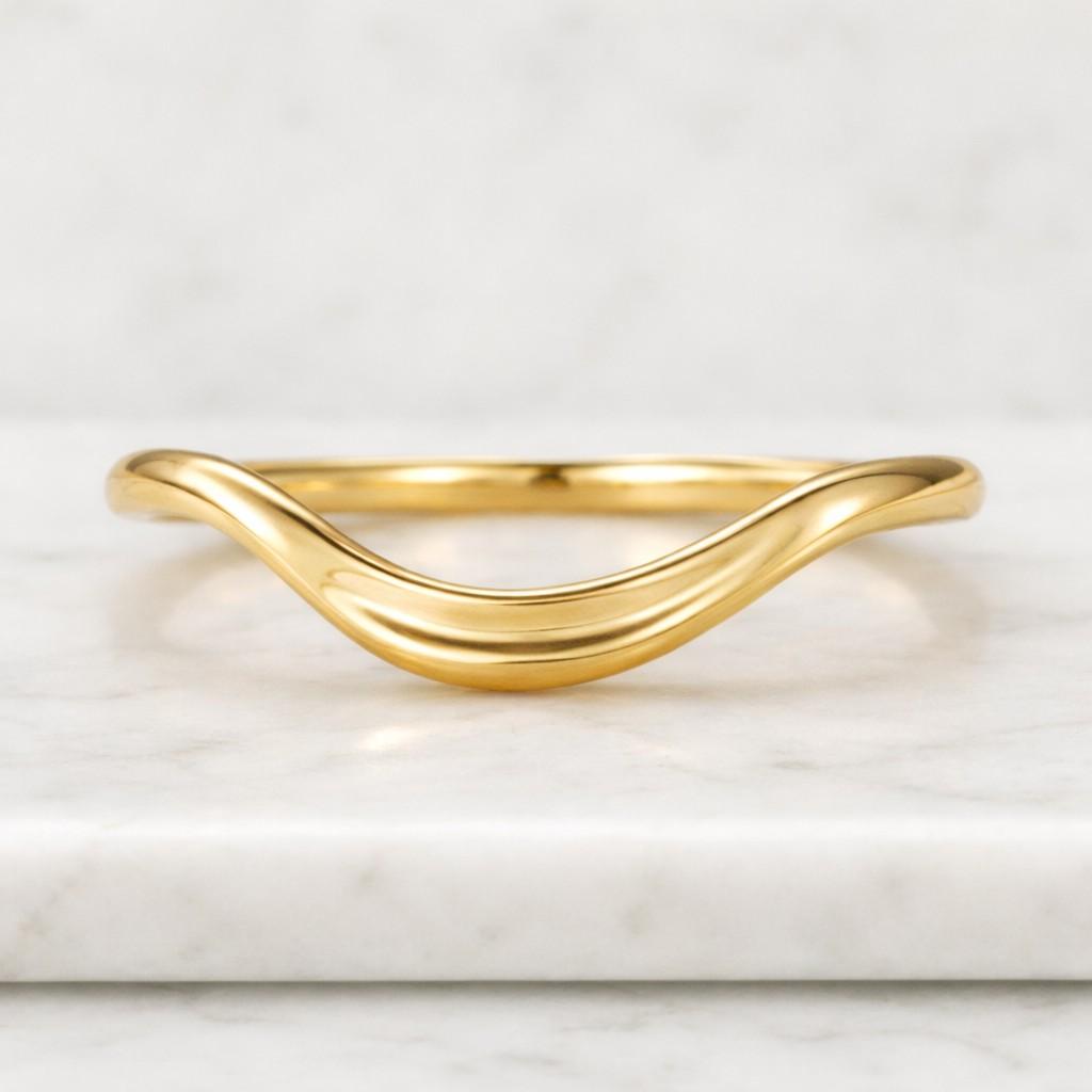 minimalist plain curved wedding band 