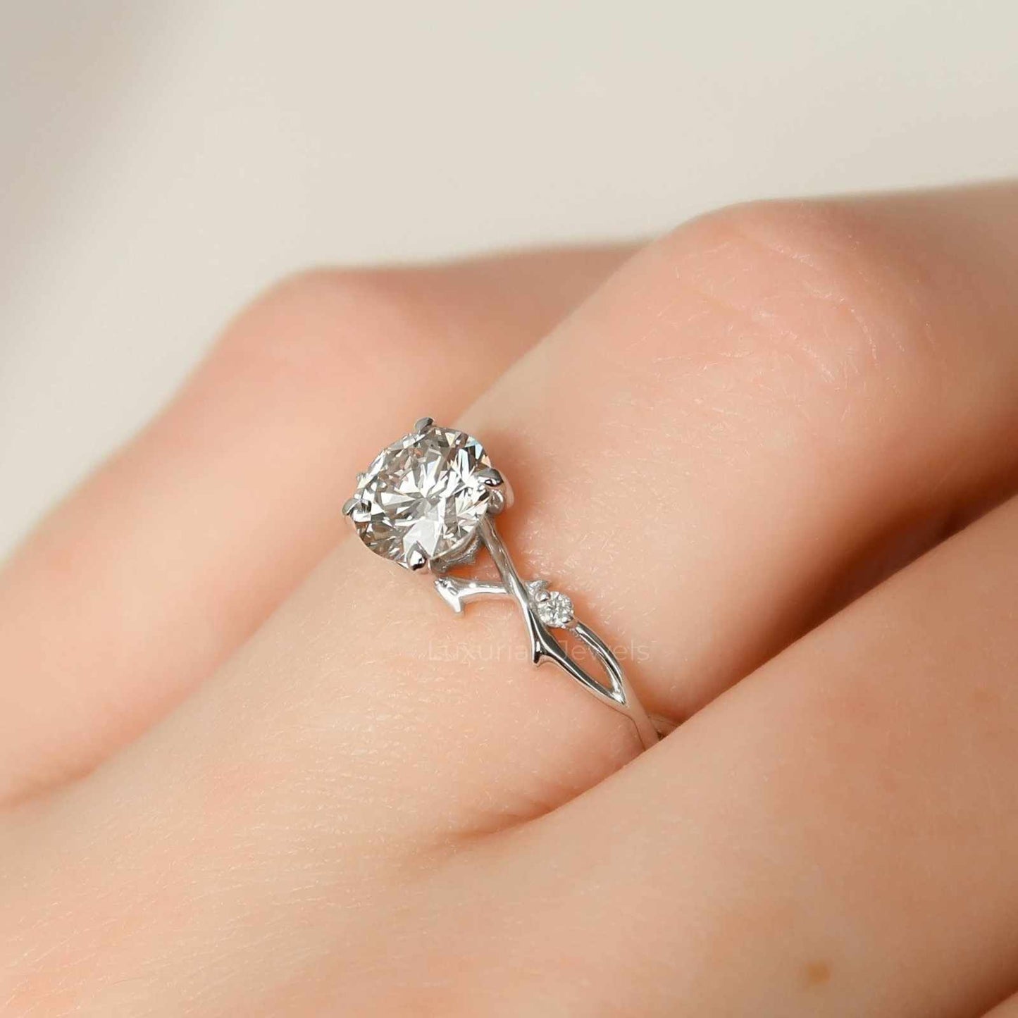 nature inspired round cut diamond solitaire ring
