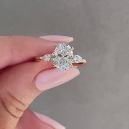 Oval 2.5 carat IGI Certified F Color VS1 Clarity Lab Grown Diamond Three Stone Engagement Ring