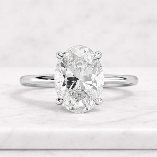 Oval Cut Hidden Halo Engagement Ring 