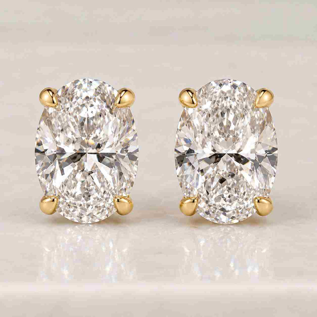 oval cut lab grown diamond bezel stud earrings, igi certified, solid gold screw back, handmade new york,minimalist fine jewelry gift for her
