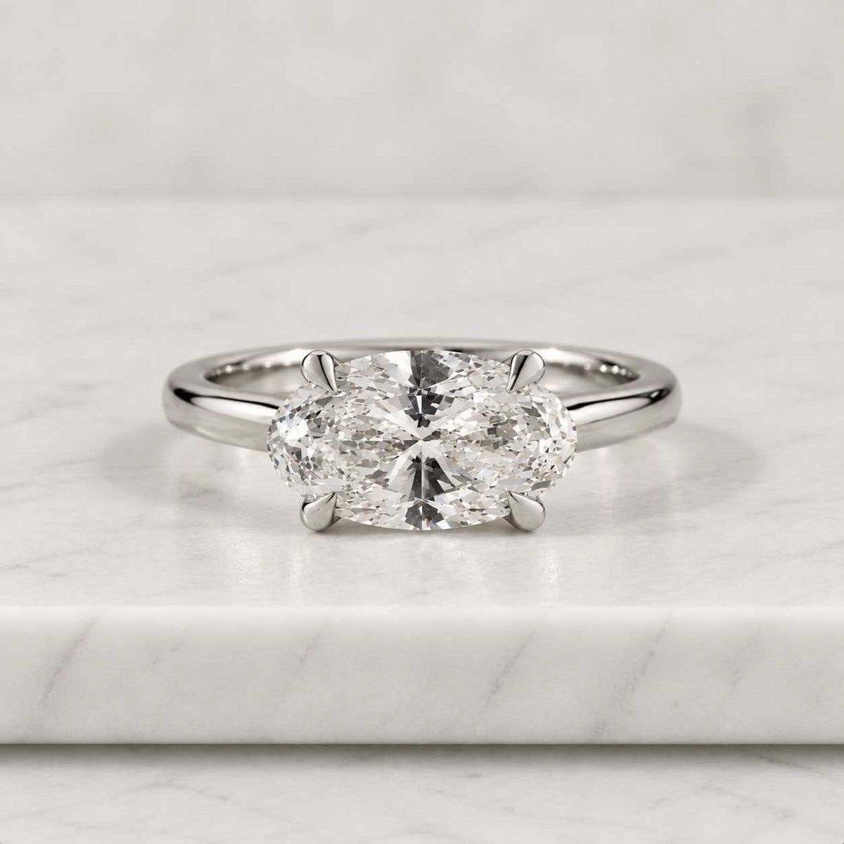 oval cut moissanite solitaire engagement ring in 14k yellow gold