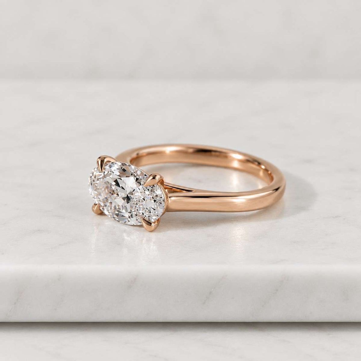oval cut moissanite solitaire engagement ring in 14k yellow gold