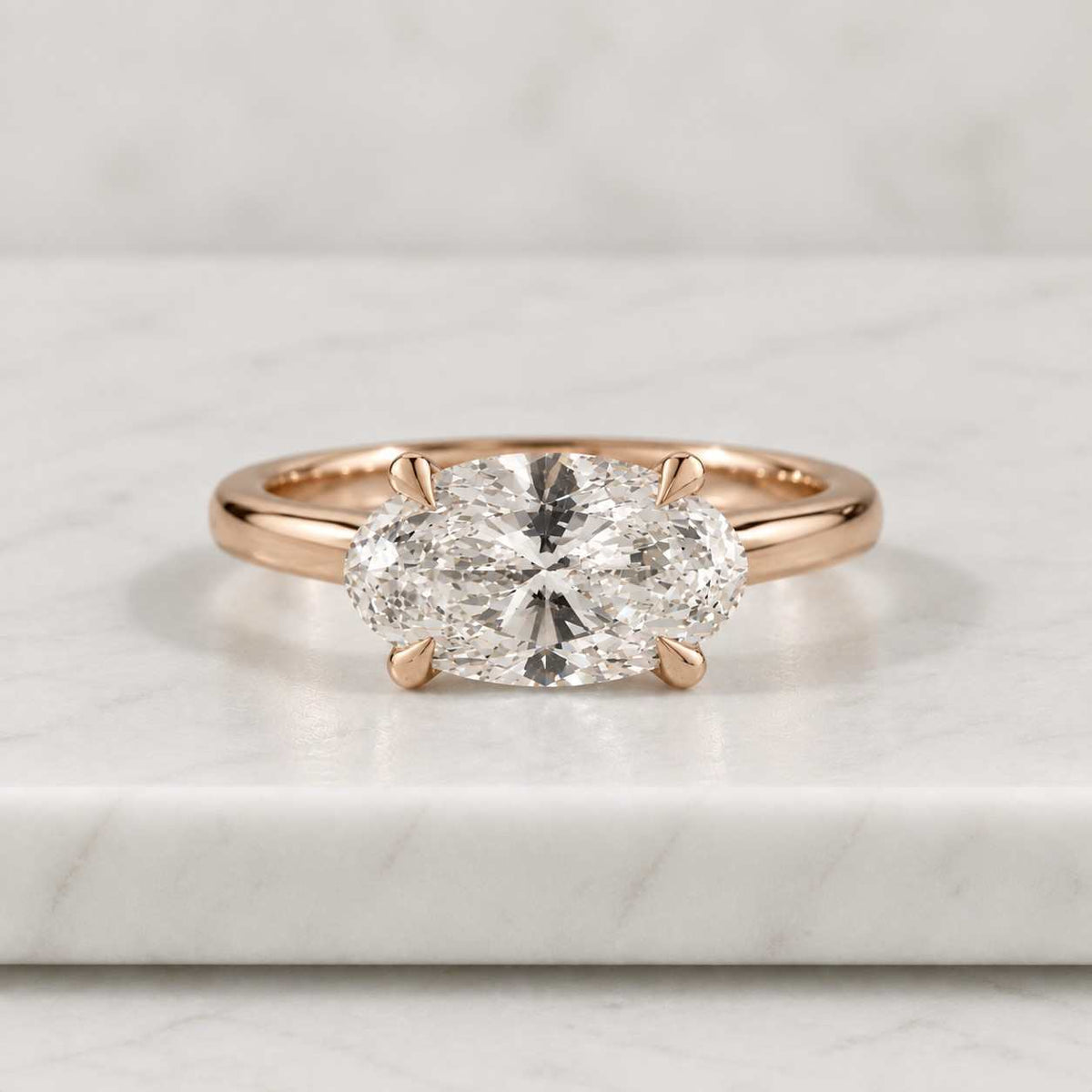 oval cut moissanite solitaire engagement ring in 14k yellow gold