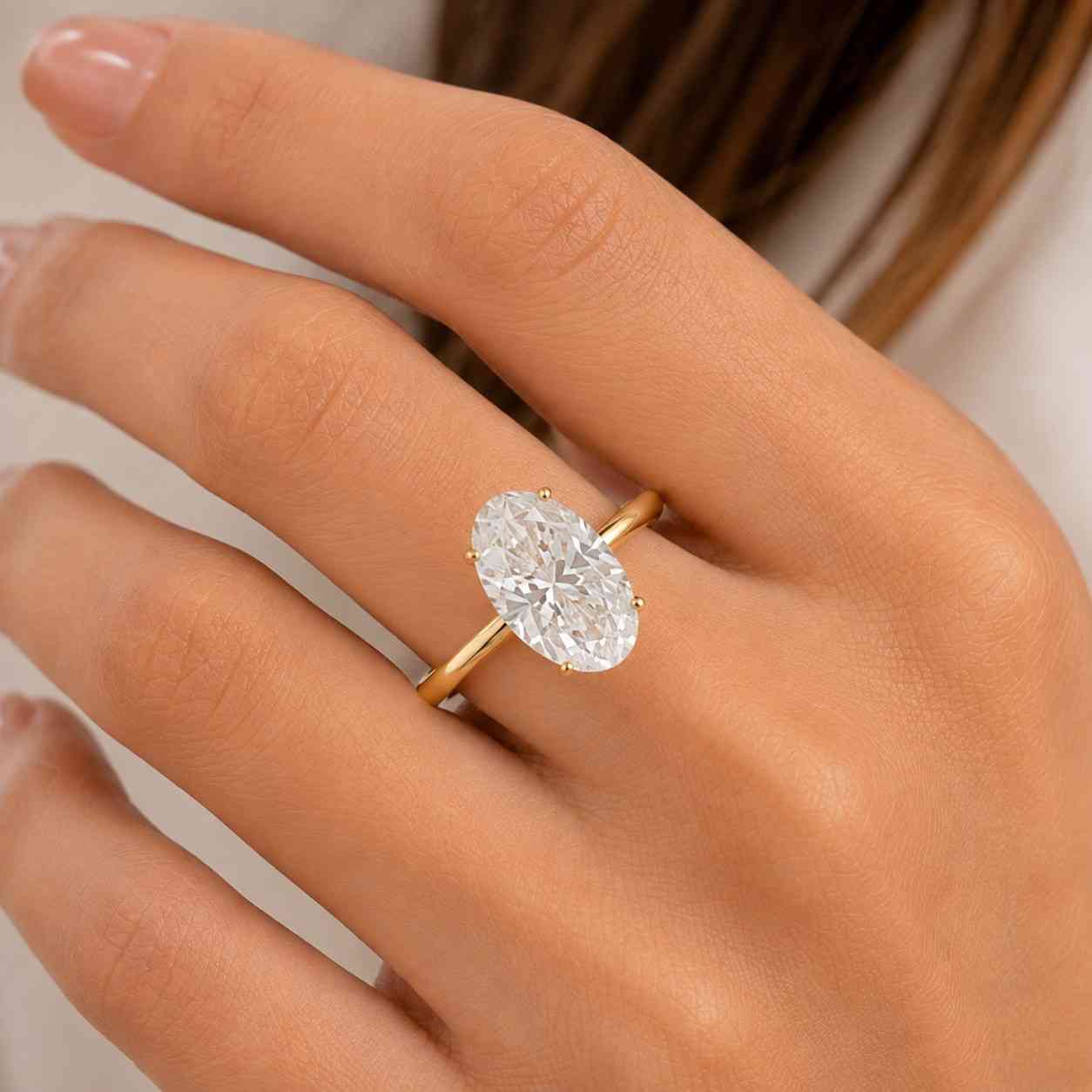 oval lab grown diamond engagement ring: 6 prongs tulip basket setting