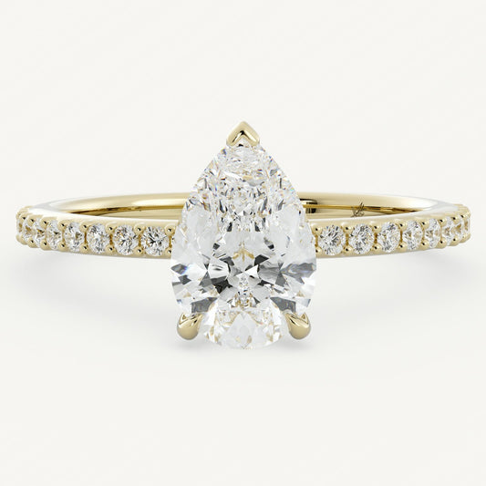 Pear Cut Colorless Claw Prong Set Diamond Ring