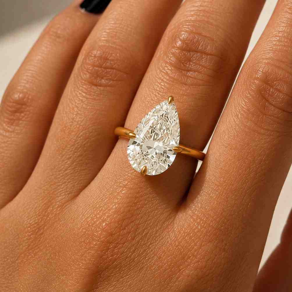 pear cut lab grown diamond solitaire engagement ring 14k yellow gold 5 prongs