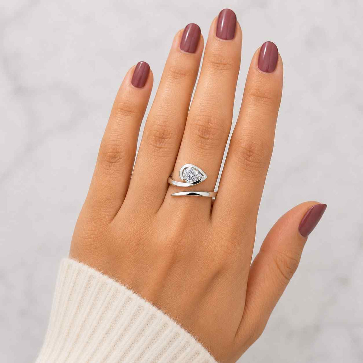 pear cut lab grown diamond solitaire ring, open wrap gold band, minimalist engagement ring