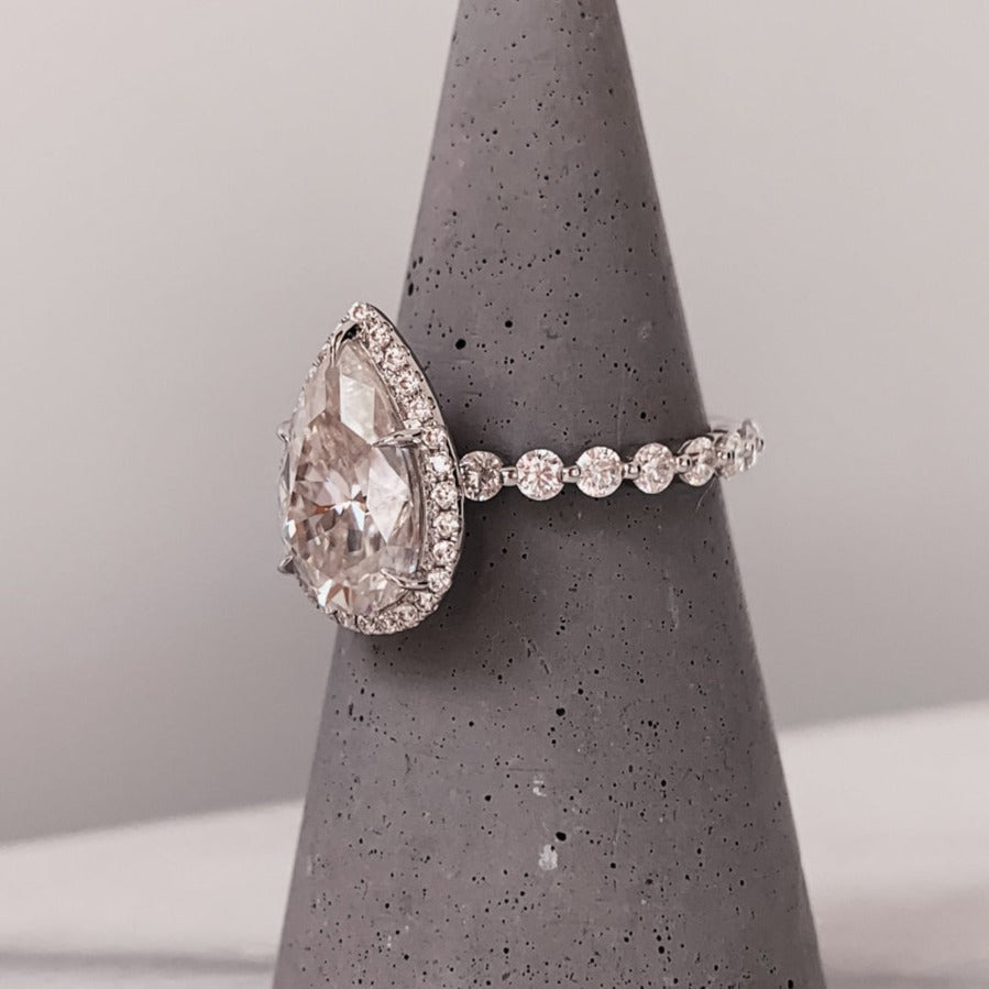 Pear Cut Moissanite Ring With Halo