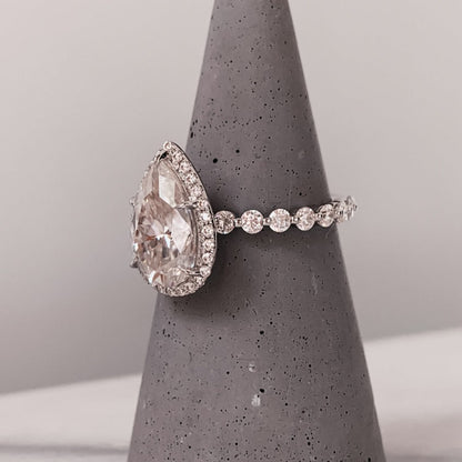 Pear Cut Moissanite Ring With Halo