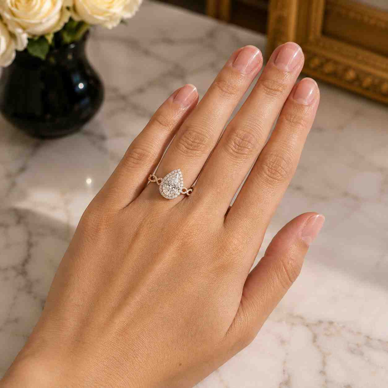 pear moissanite engagement ring, twisted pavé gold band, timeless elegance